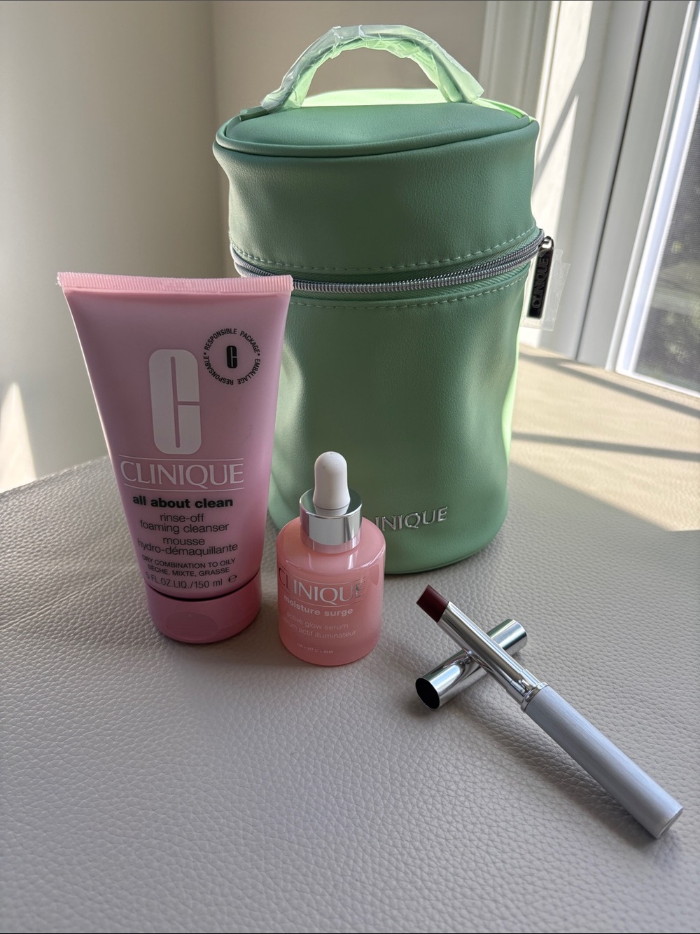 Clinique skincare set with cosmetic bag